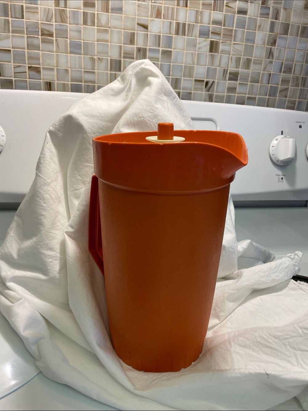 Orange Tupperware Beverage Pitcher with Lid